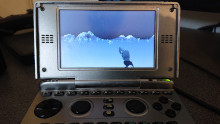 A photograph of FLAT running on an OpenPandora handheld console